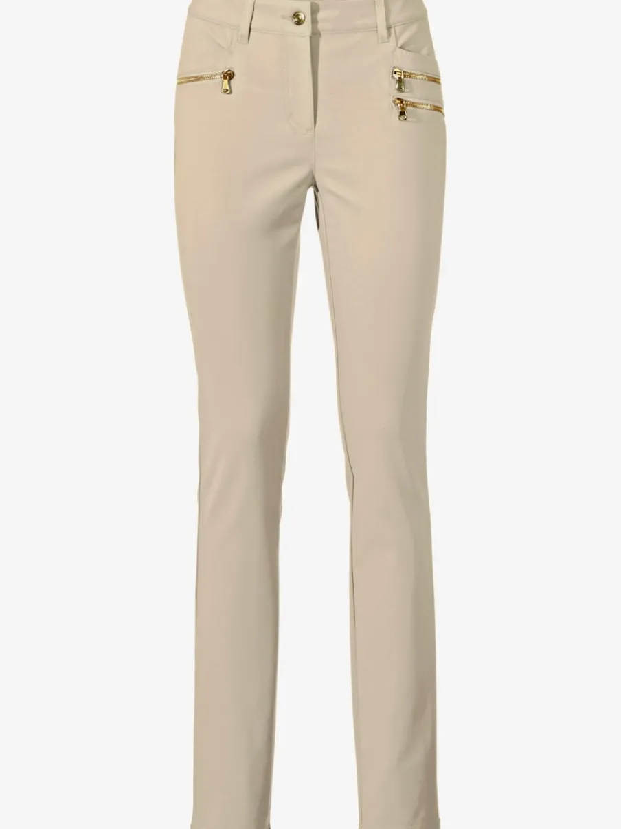 Pantalons extensibles avec coutures push-up et poches intégrées