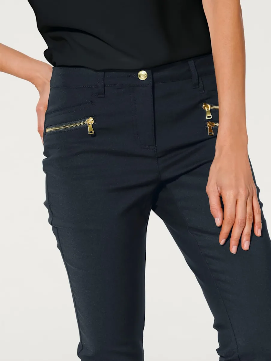 Pantalons extensibles avec coutures push-up et poches intégrées