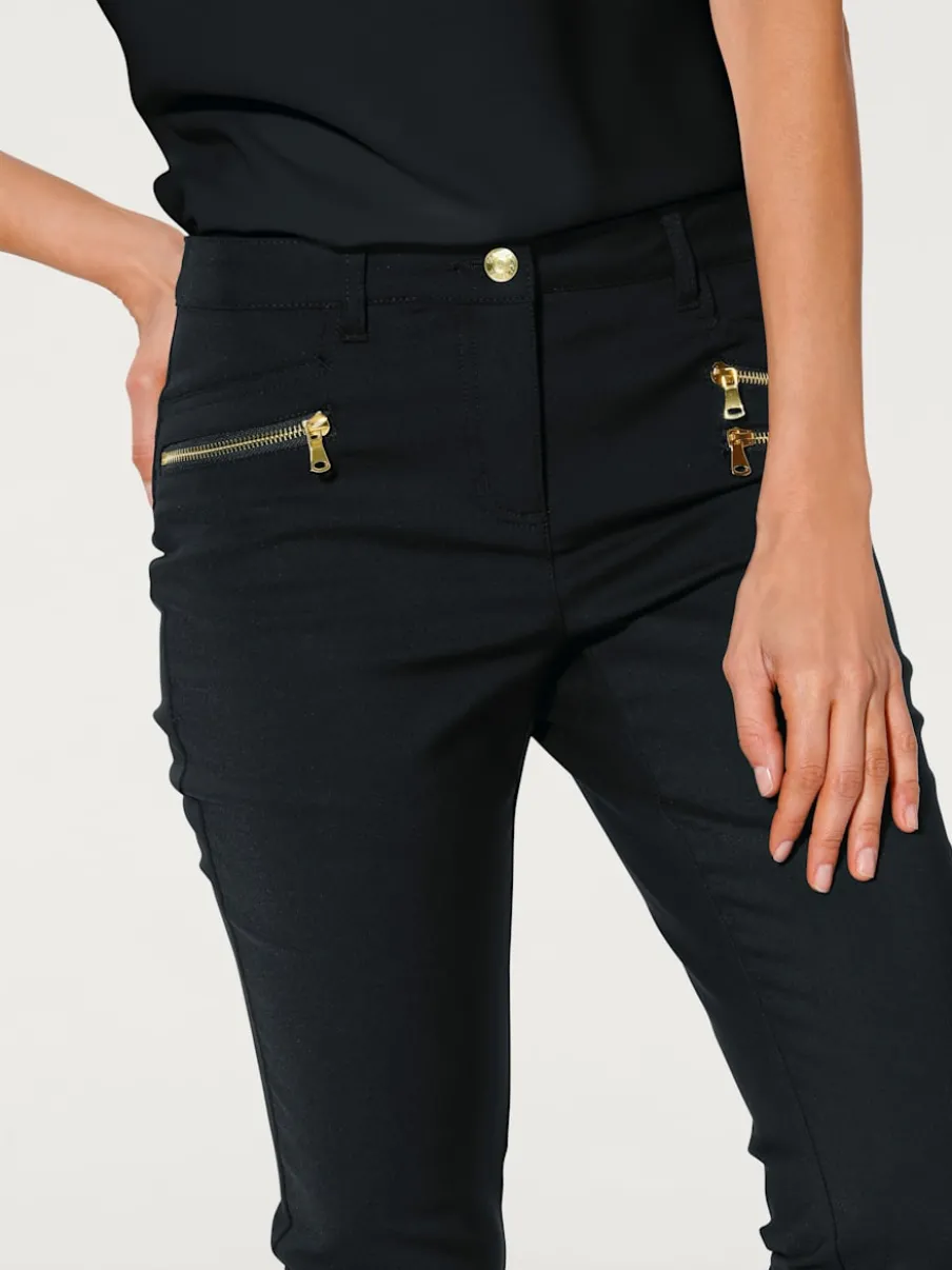 Pantalons extensibles avec coutures push-up et poches intégrées