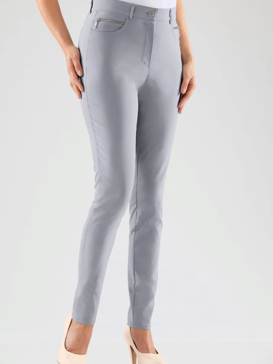 Pantalons extensibles avec poches zippées et passants