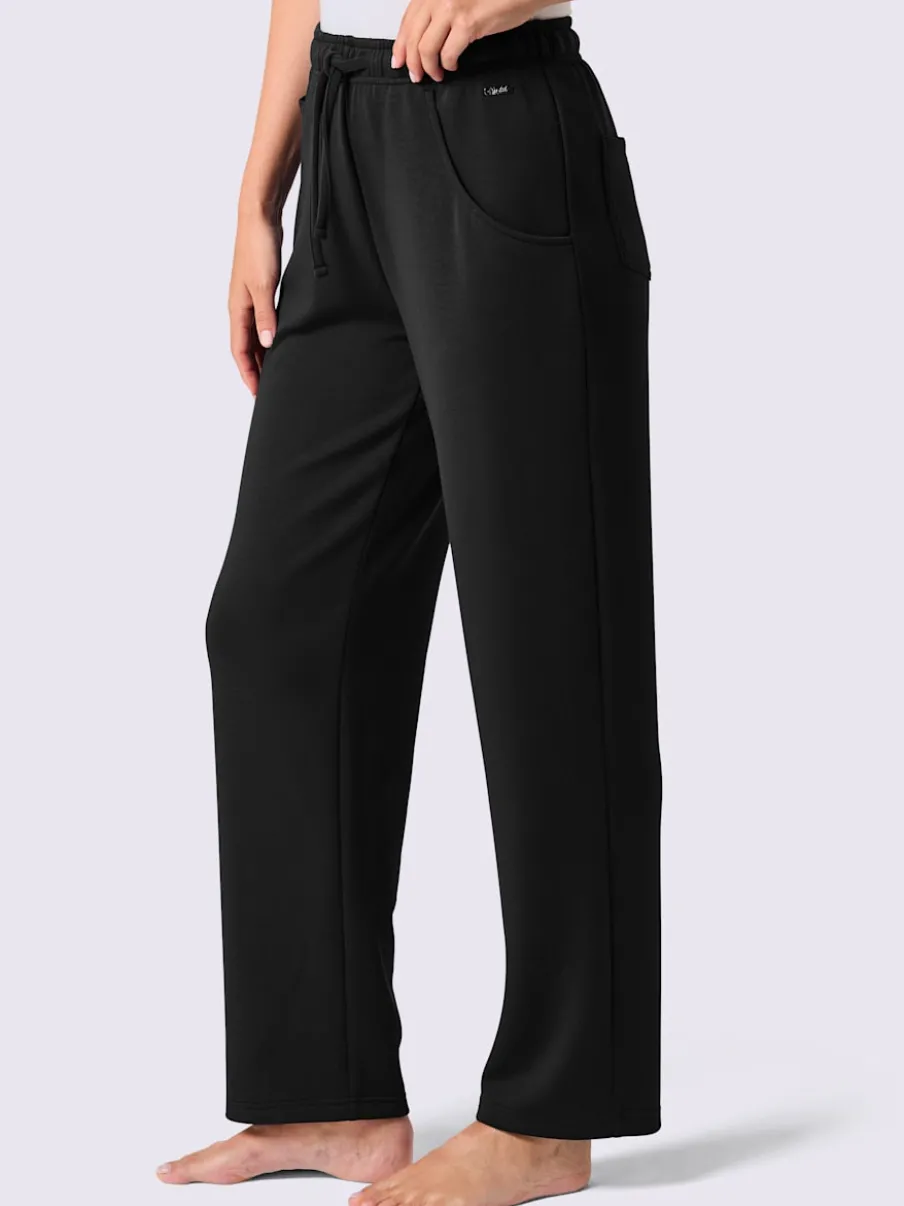 Pantalons fluides avec ceinture et poches pratiques