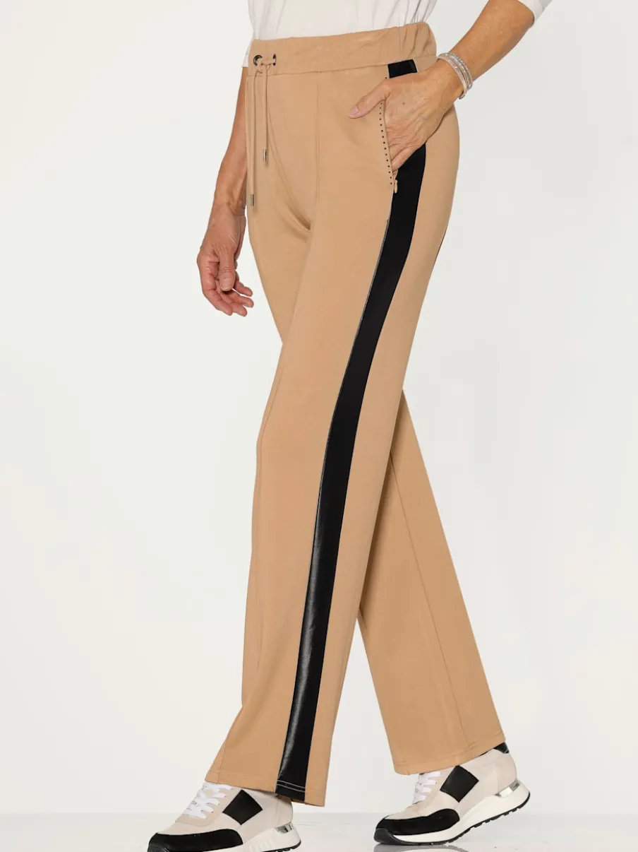 Pantalons fluides avec ceinture élastique et poches zippées