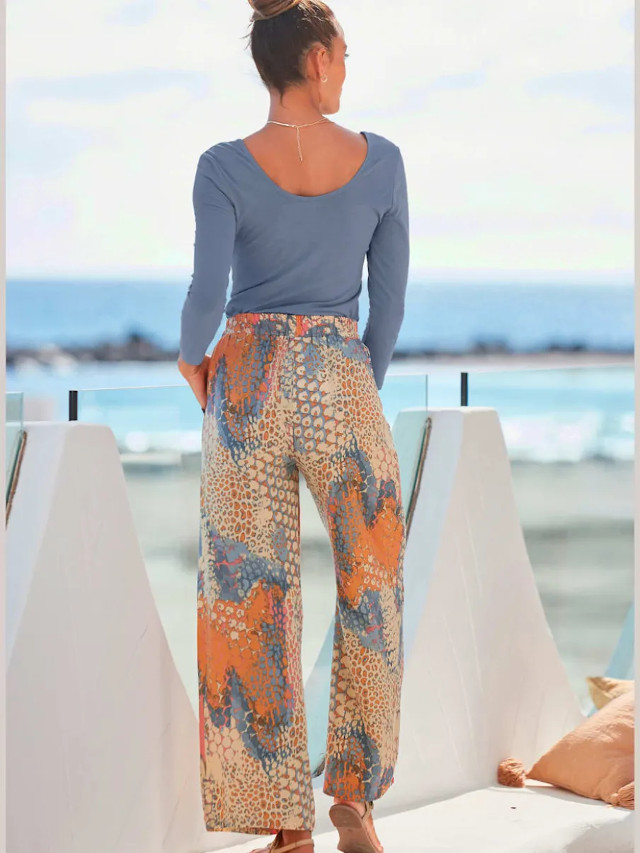 Pantalons fluides avec motifs et ceinture à nouer