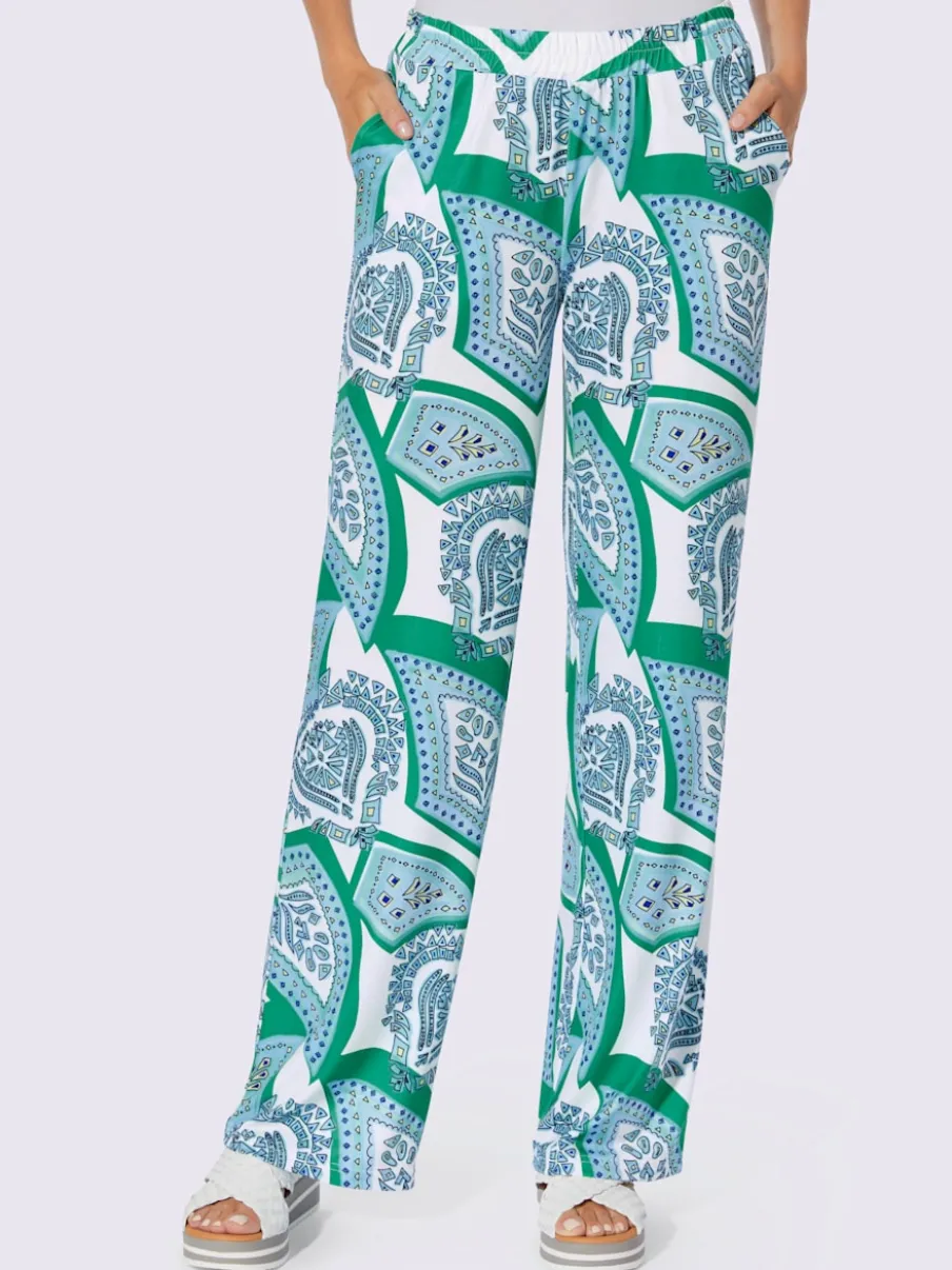 Pantalons fluides à l'imprimé extravagant avec poches