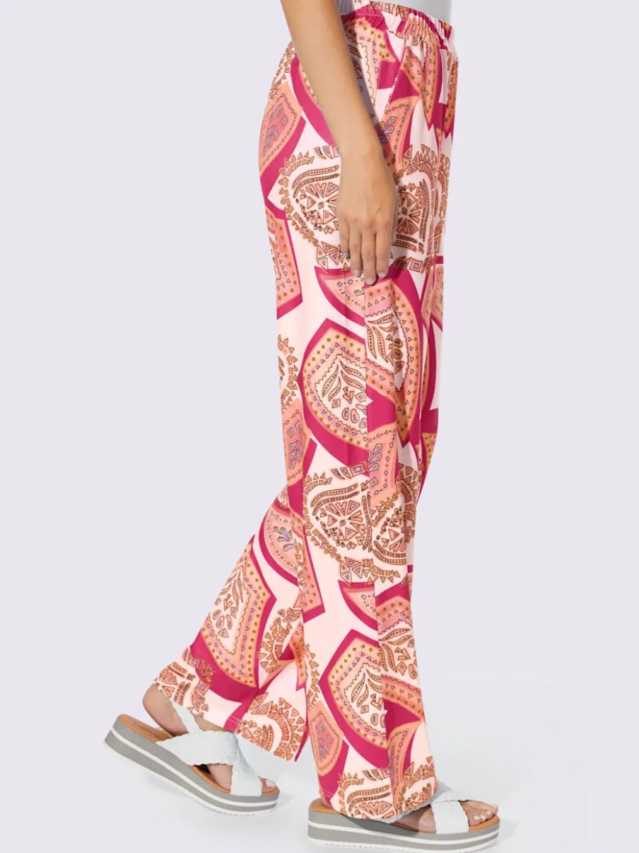 Pantalons fluides à l'imprimé extravagant avec poches