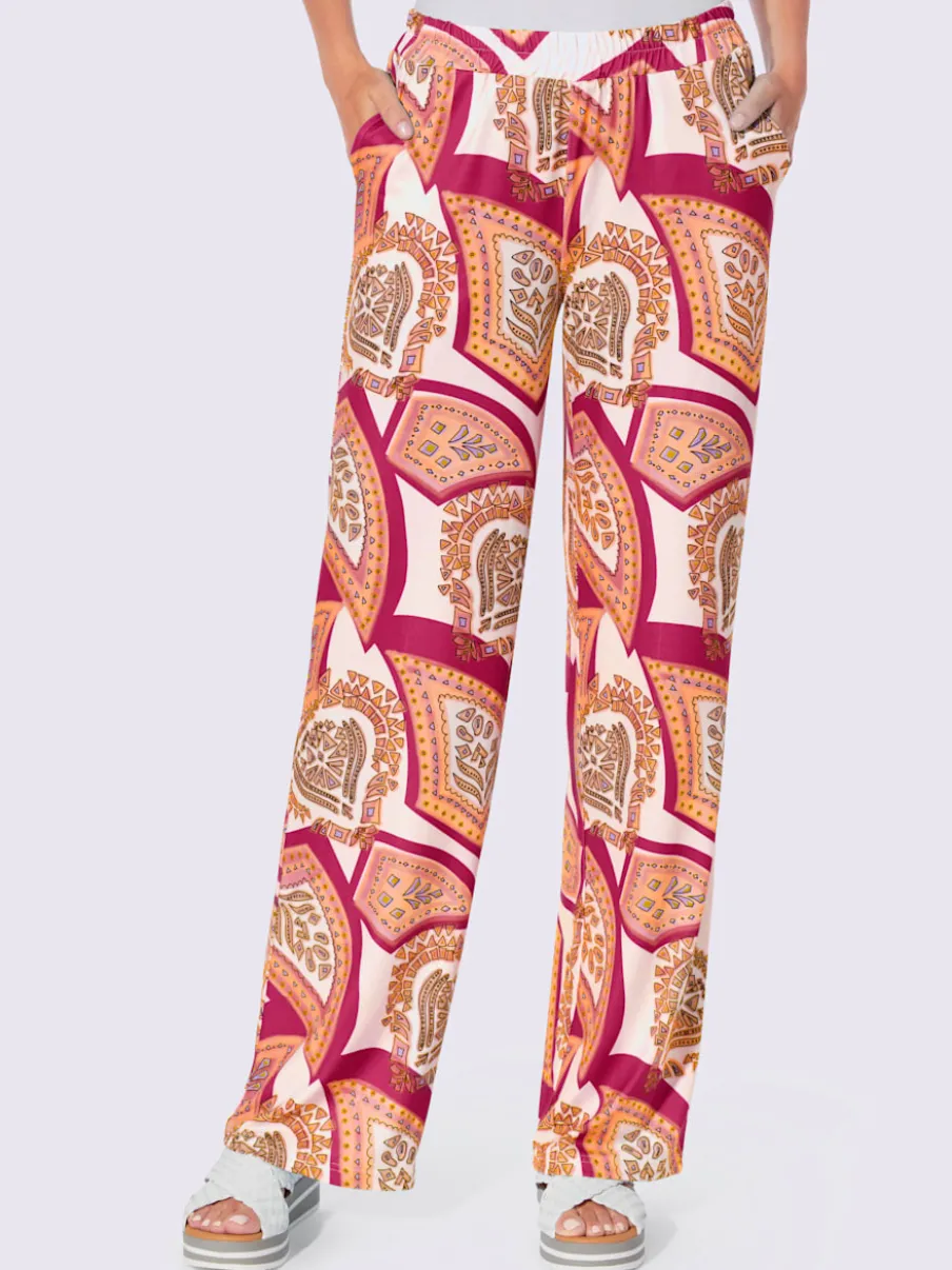 Pantalons fluides à l'imprimé extravagant avec poches