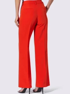 Pantalons à jambes larges avec plis et poches décoratives