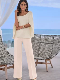 Pantalons à jambes larges avec plis et poches décoratives