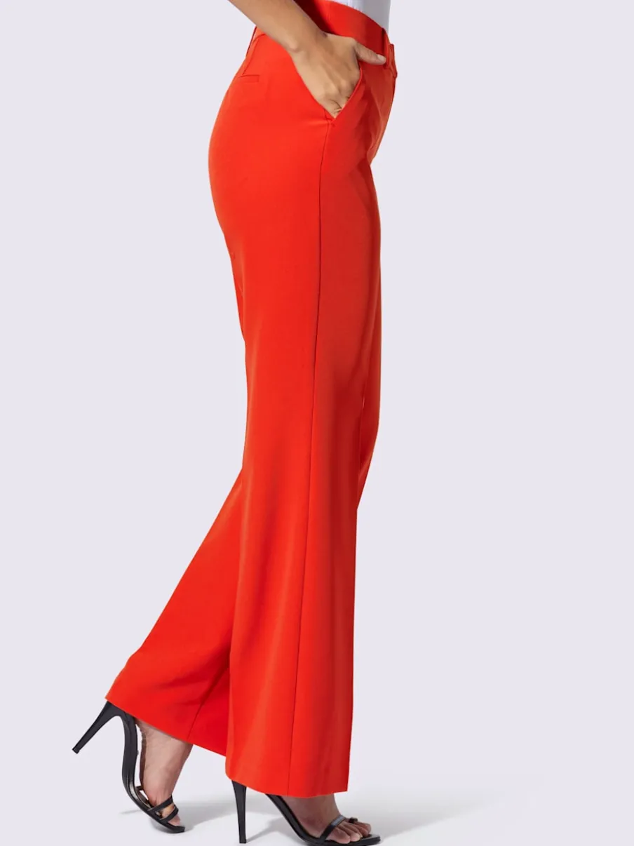 Pantalons à jambes larges avec plis et poches décoratives