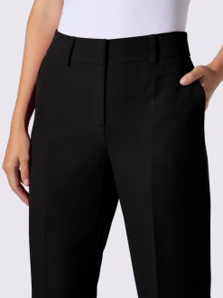 Pantalons à jambes larges avec plis et poches décoratives