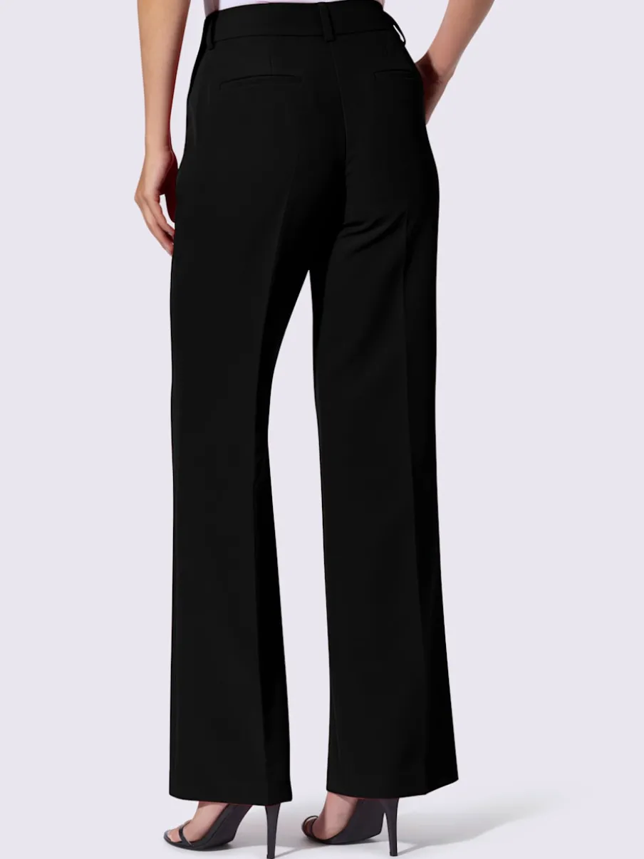 Pantalons à jambes larges avec plis et poches décoratives