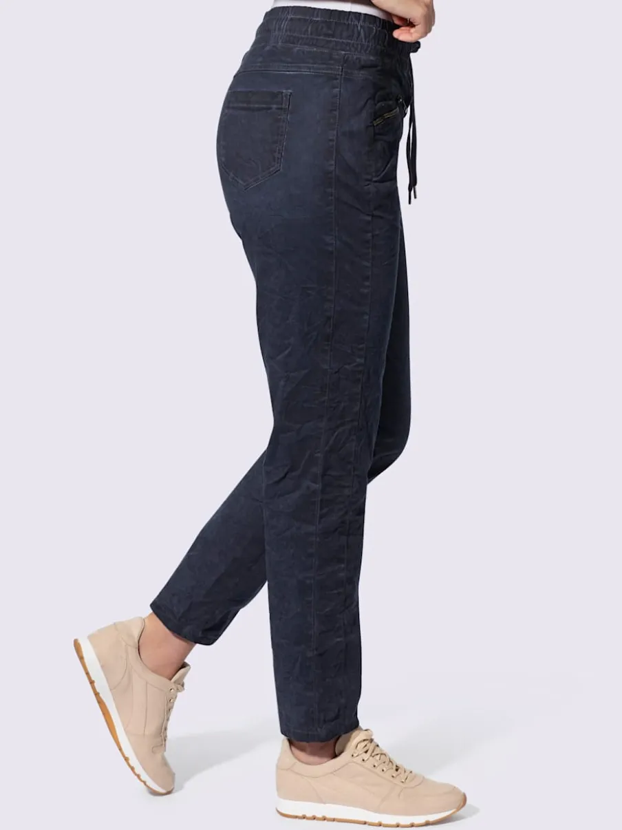 Pantalons jogging avec poches zippées et ceinture élastique