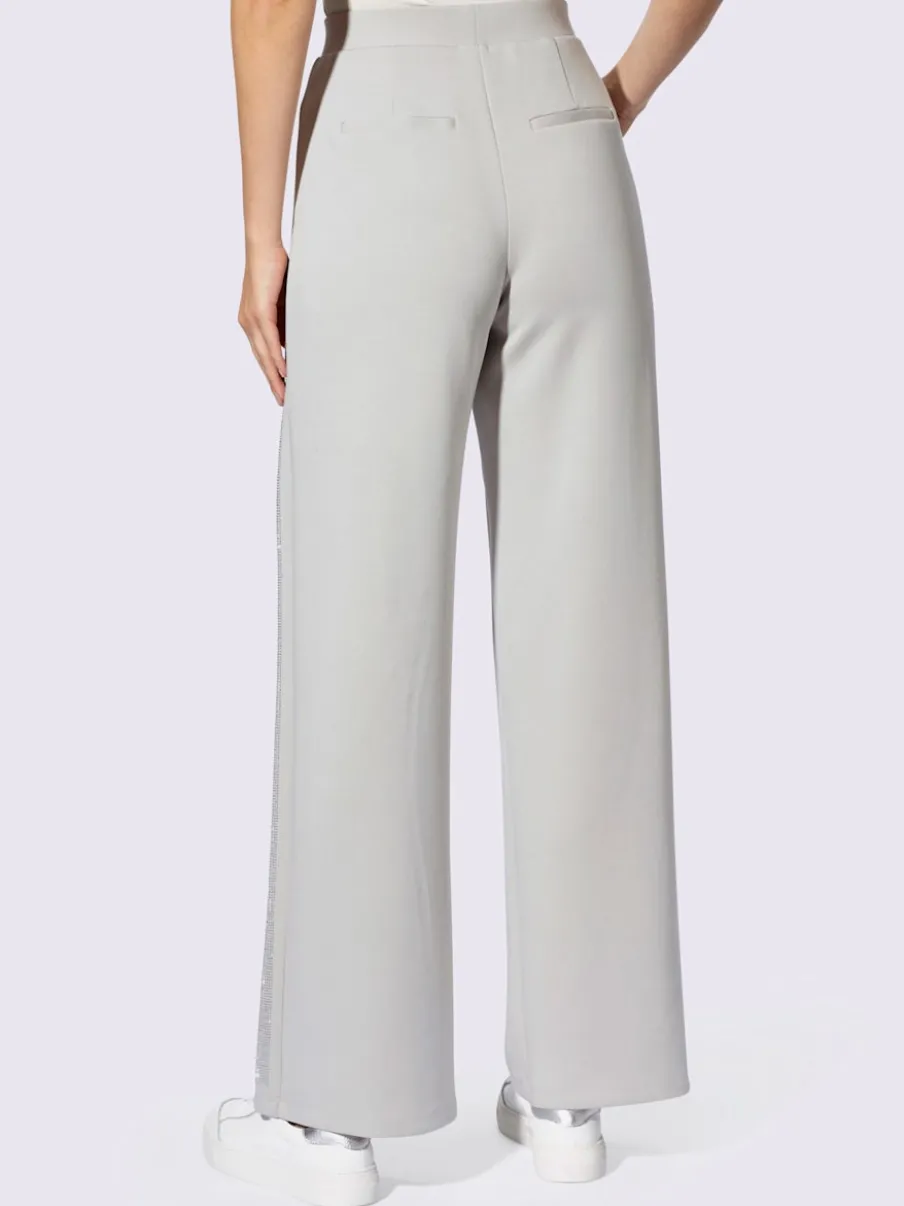 Pantalons larges avec poches avant et pierres brillantes