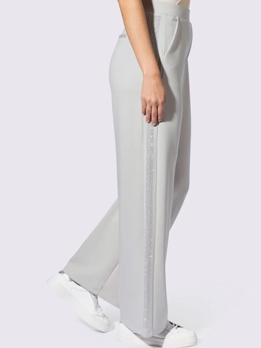 Pantalons larges avec poches avant et pierres brillantes