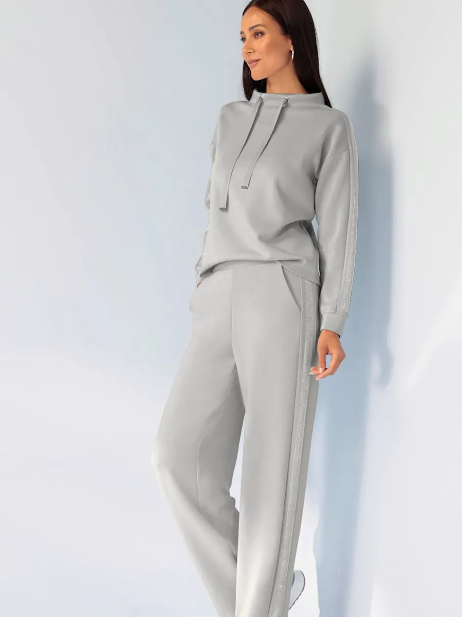 Pantalons larges avec poches avant et pierres brillantes
