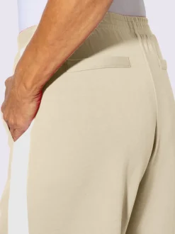Pantalons larges en jersey avec ceinture élastique et poches