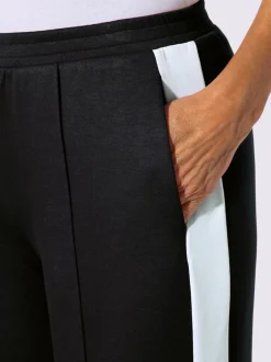 Pantalons larges en jersey avec ceinture élastique et poches
