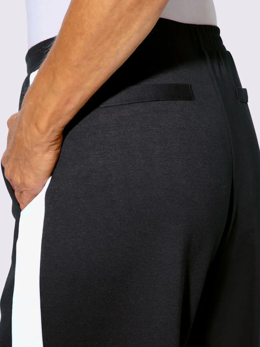 Pantalons larges en jersey avec ceinture élastique et poches