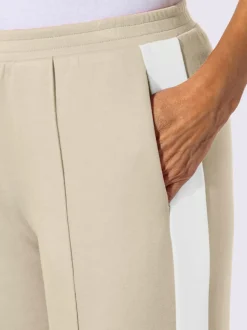 Pantalons larges en jersey avec ceinture élastique et poches