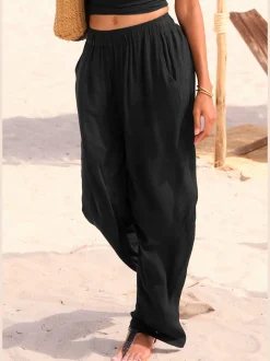 Pantalons larges en viscose avec poches latérales fendues