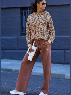 Pantalons moulants avec poches élastiques et empiècements côtelés