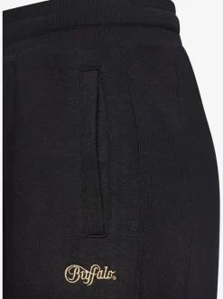 Pantalons moulants avec poches élastiques et empiècements côtelés