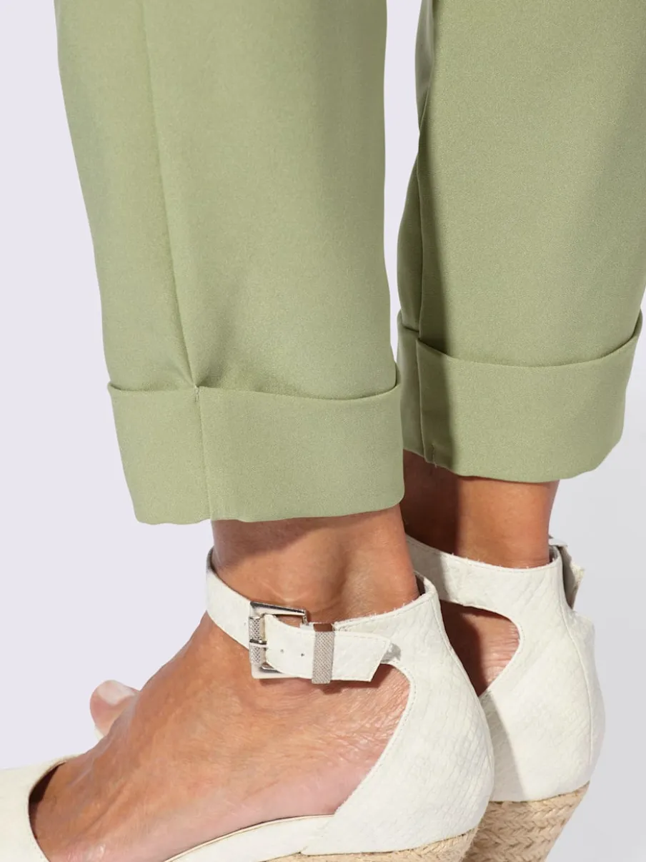 Pantalons à pinces avec ceinture élastique et poches
