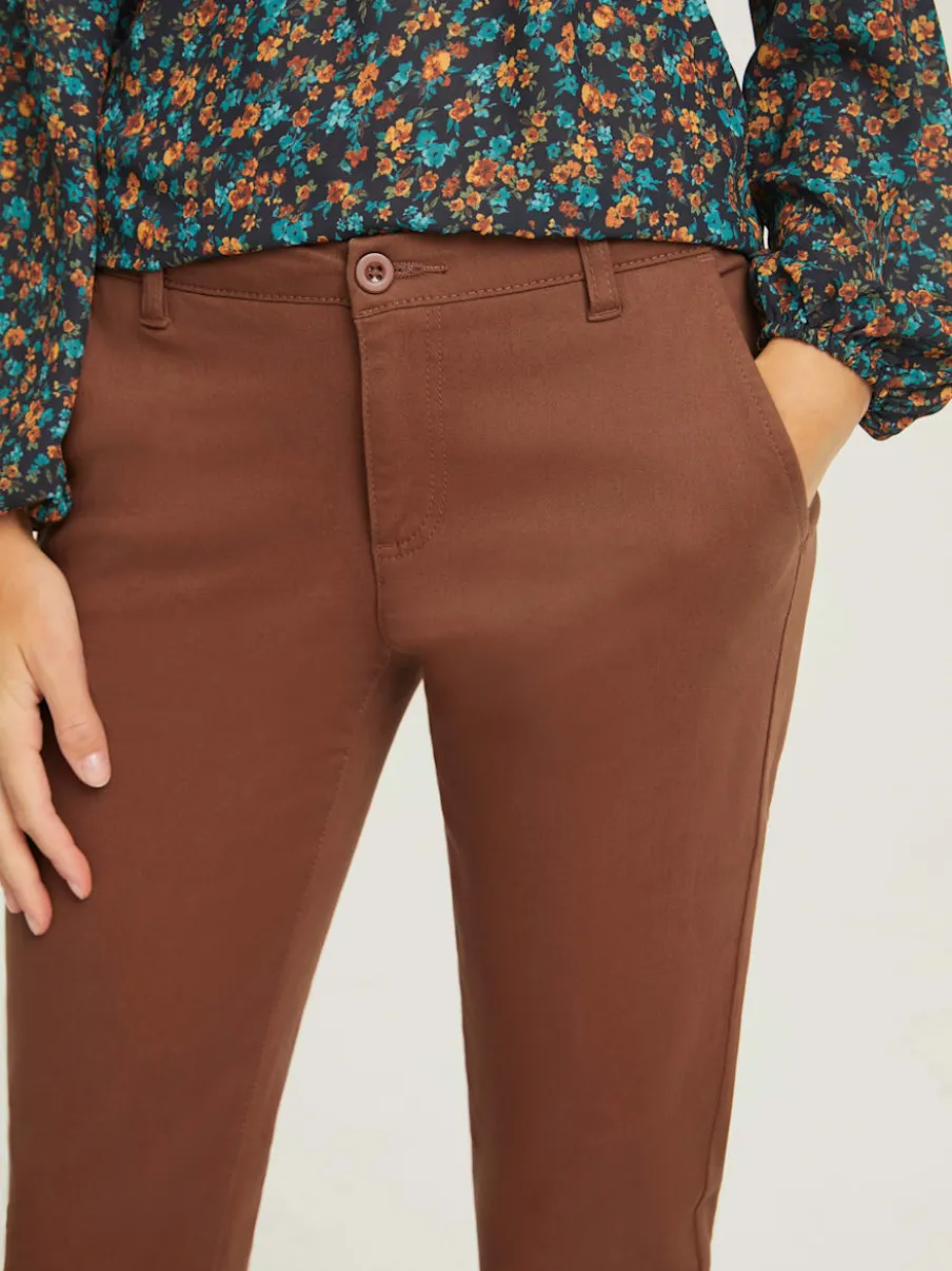 Pantalons skinny avec poches fendues et passants fermés
