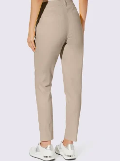 Pantalons skinny extensibles avec poches décoratives et fente