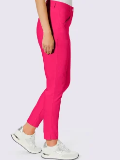 Pantalons skinny extensibles avec poches décoratives et fente