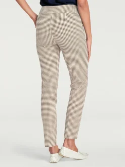 Pantalons skinny à poches fendues et motif géométrique