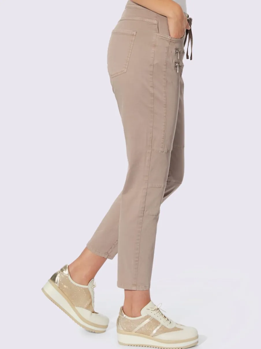 Pantalons sportifs avec glissières et poches pratiques