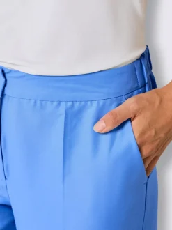 Pantalons tailleurs en soie avec poches et fermeture discrète