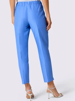 Pantalons tailleurs en soie avec poches et fermeture discrète