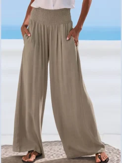 Pantalon structuré à ceinture smockée et poches latérales