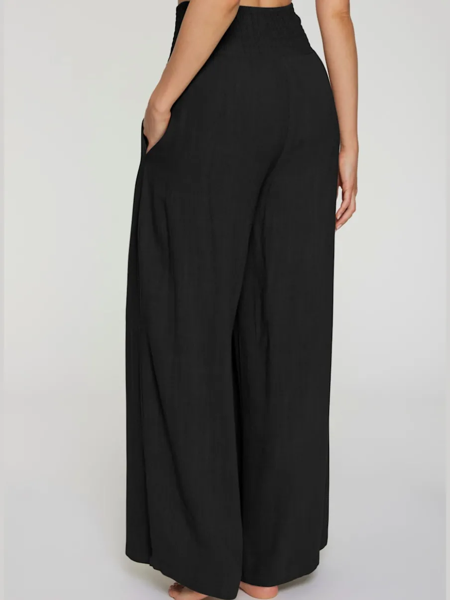 Pantalon structuré à ceinture smockée et poches latérales
