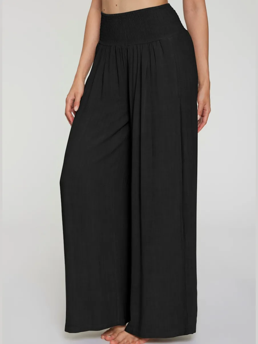 Pantalon structuré à ceinture smockée et poches latérales