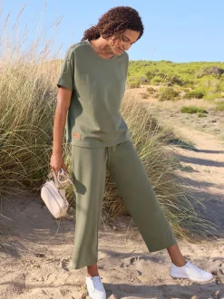 Pantalon sweat court avec ceinture élastique et poches
