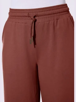 Pantalon sweat court avec ceinture élastique et poches
