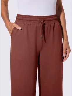 Pantalon sweat court avec ceinture élastique et poches
