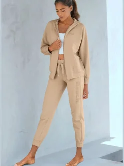 Pantalon sweat élastique doux avec poches à glissière et bords-côtes