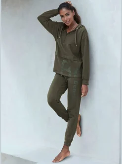 Pantalon sweat élastique doux avec poches à glissière et bords-côtes
