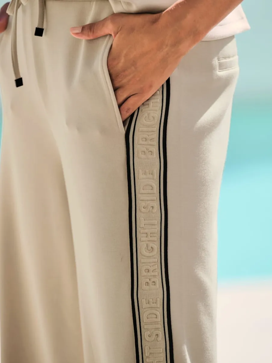 Pantalon sweat à rayures galon avec ceinture élastique et poches latérales