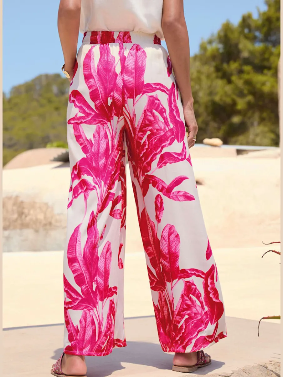 Pantalon à taille élastiquée avec poches et pinces fluides