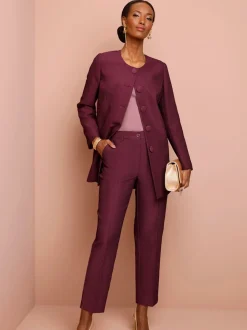 Pantalon tailleur ajusté en jacquard avec ceinture et poches latérales