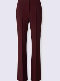 Pantalon tailleur avec nervures et poches latérales