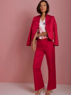 Pantalon tailleur à jambes larges avec plis repassés et poches latérales