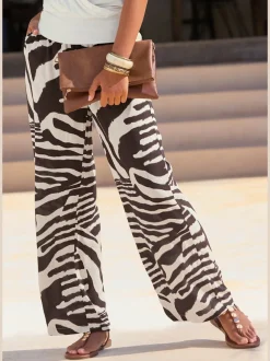 Pantalon tissé avec large ceinture élastique et poches latérales à imprimé animal