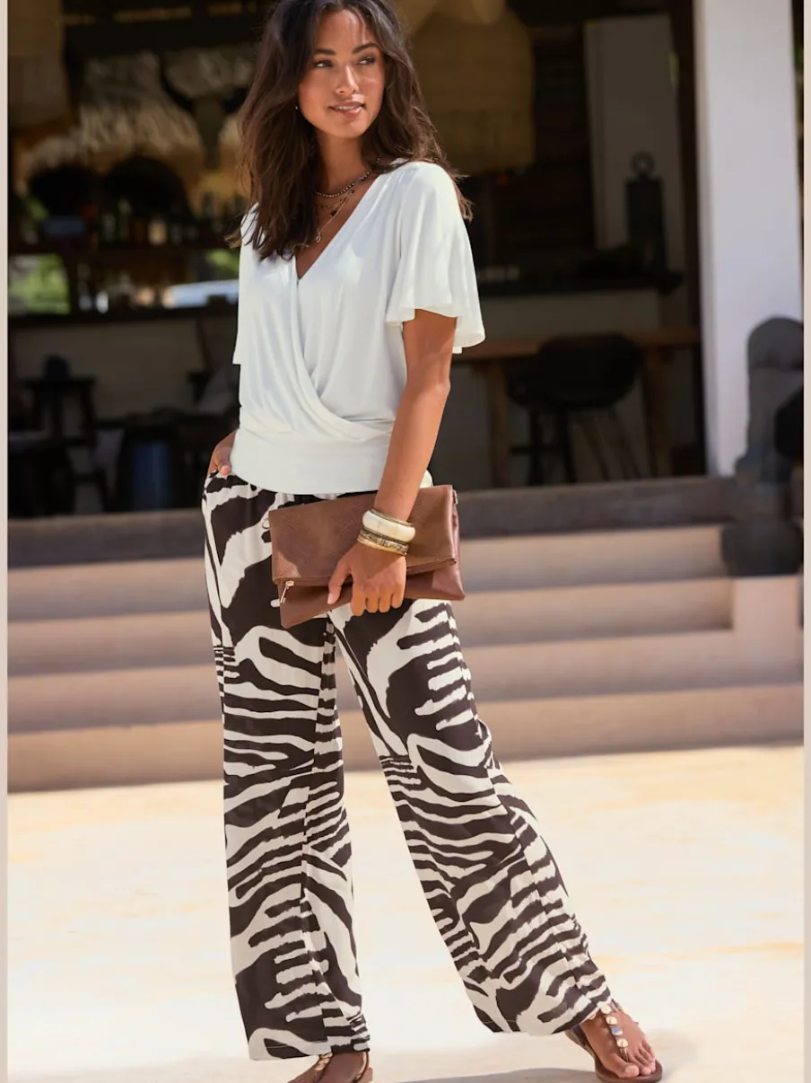 Pantalon tissé avec large ceinture élastique et poches latérales à imprimé animal