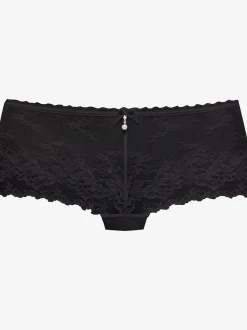 Panty féminin à la coupe enveloppante avec nœud décoratif fin et élégante perle au centre devant
